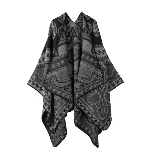 Poncho châle à motif paisley gris et noir, coupe ample avec capuche intégrée.