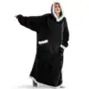 Poncho plaid noir avec capuche et poches, bordure blanche douce.