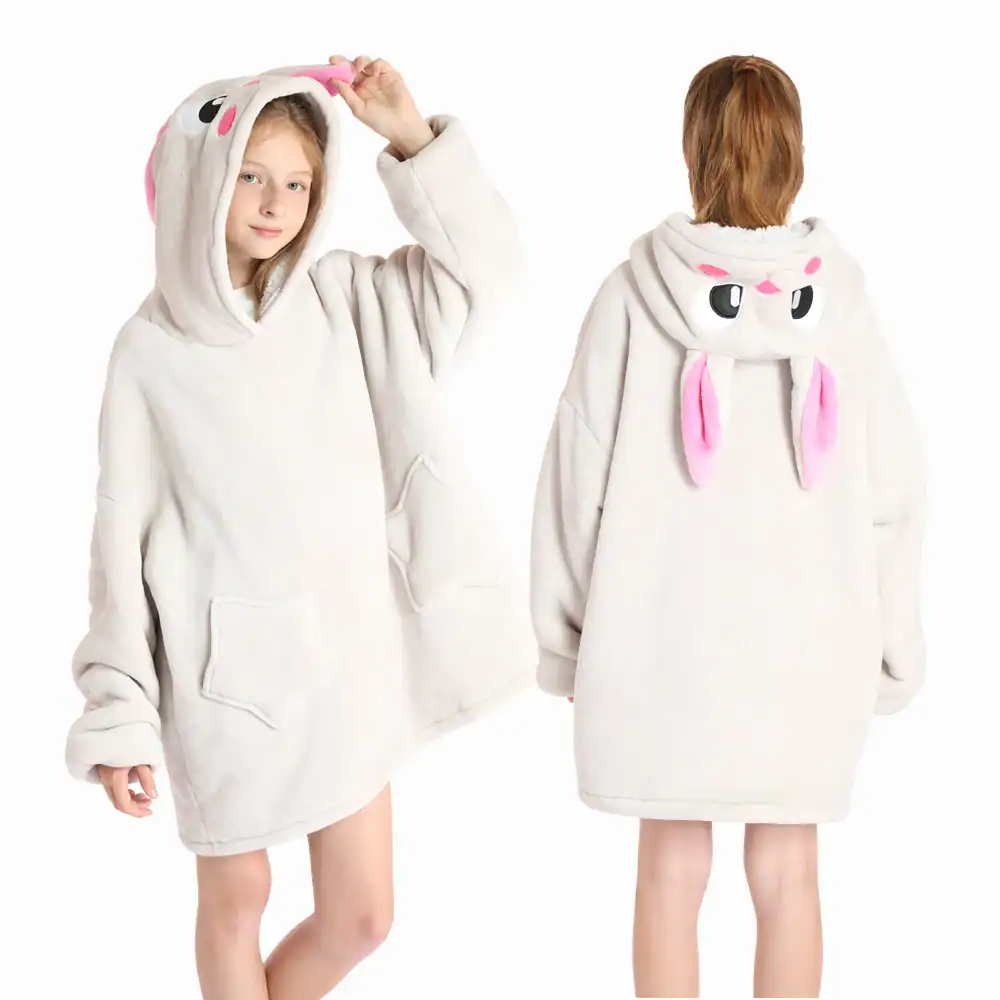 Poncho plaid enfant avec capuche lapin rose et poches.