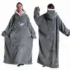 Poncho plaid gris femme long avec capuche et poche pomme.