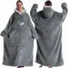 Poncho plaid femme gris avec capuche et poche avant.