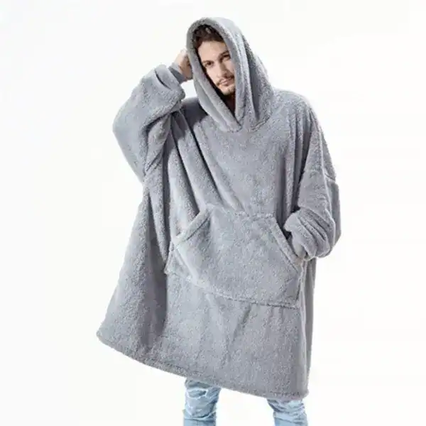 Poncho plaid homme gris, capuche, poches avant, look décontracté.